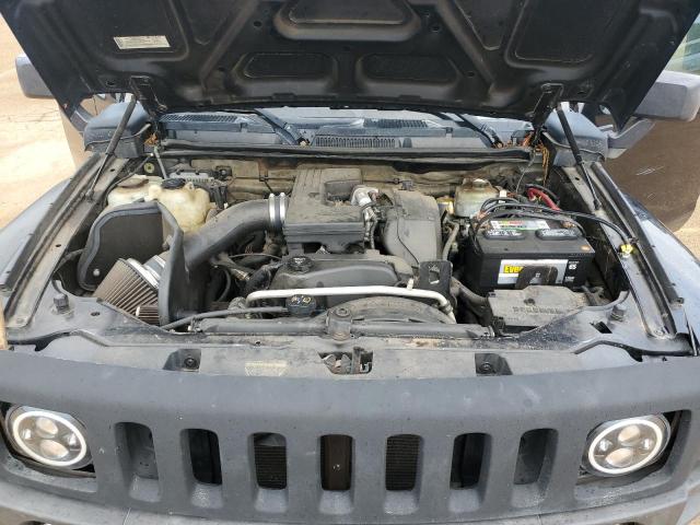 Photo 12 from auction – 2007 HUMMER H3 with VIN 5GTDN13EX78134129