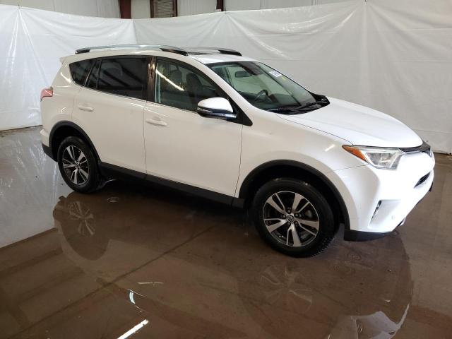 Photo 4 from auction – 2017 TOYOTA RAV4 XLE with VIN JTMWFREV8HD095039
