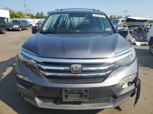 Photo 5 from auction – 2018 HONDA PILOT TOUR with VIN 5FNYF6H97JB012141
