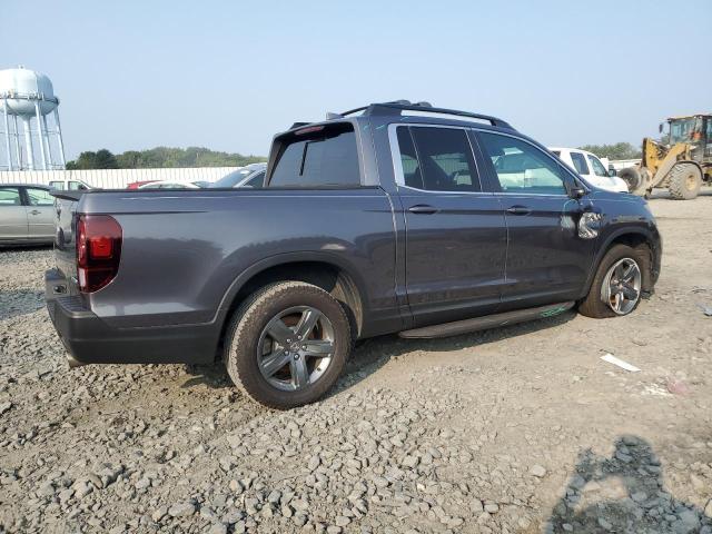 Photo 3 from auction – 2023 HONDA RIDGELINE with VIN 5FPYK3F53PB032171
