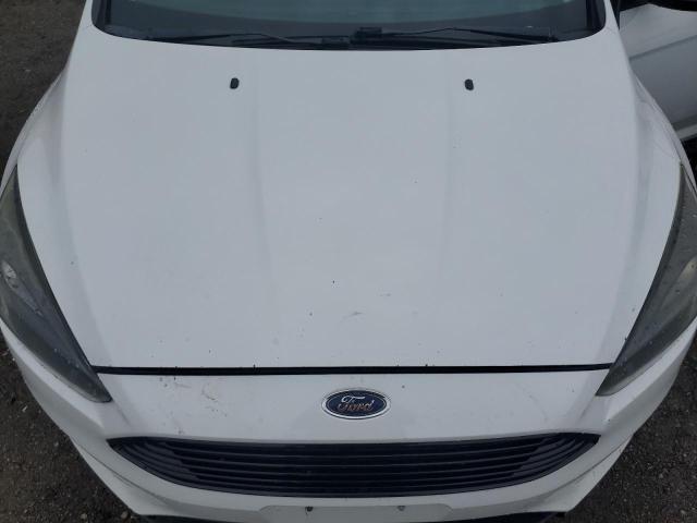 Photo 11 from auction – 2016 FORD FOCUS SE with VIN 1FADP3F24GL316541