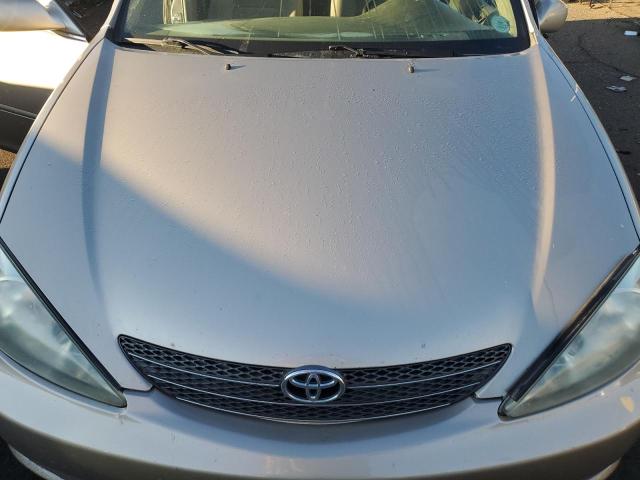 Photo 11 from auction – 2004 TOYOTA CAMRY LE with VIN 4T1BE30K64U799581