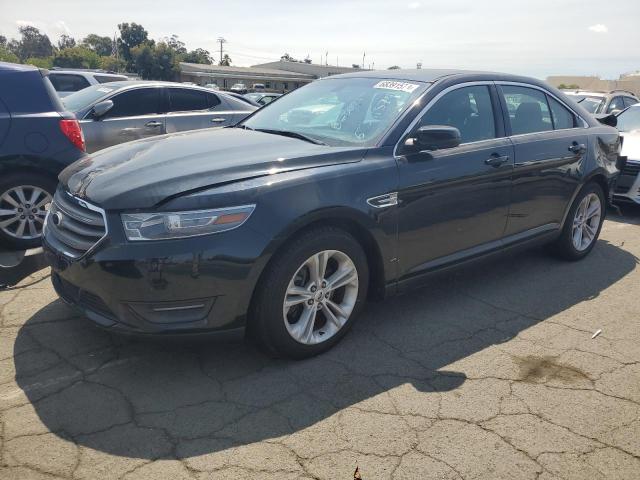 FORD TAURUS SEL 2014 with VIN 1FAHP2H86EG148095 - Photo from auction
