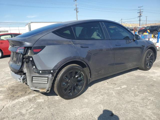 Снимка 3 от търг – 2023 TESLA MODEL Y с VIN 7SAYGDED0PF972097