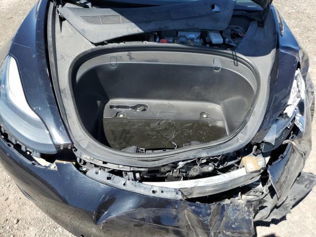Photo 11 from auction – 2018 TESLA MODEL 3 with VIN 5YJ3E1EB3JF100336