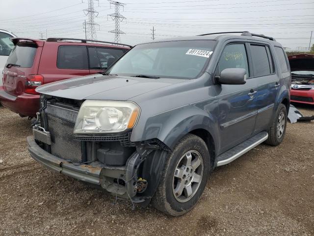 HONDA PILOT TOUR 2011 with VIN 5FNYF4H92BB027510 - Photo from auction
