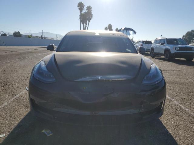 Photo 5 from auction – 2021 TESLA MODEL 3 with VIN 5YJ3E1EB0MF998107