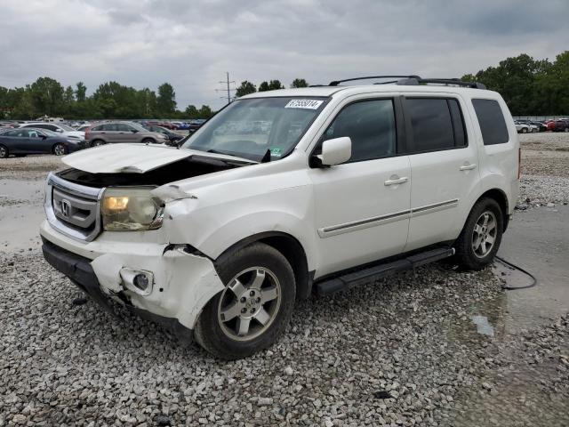HONDA PILOT TOUR 2011 with VIN 5FNYF4H97BB046182 - Photo from auction