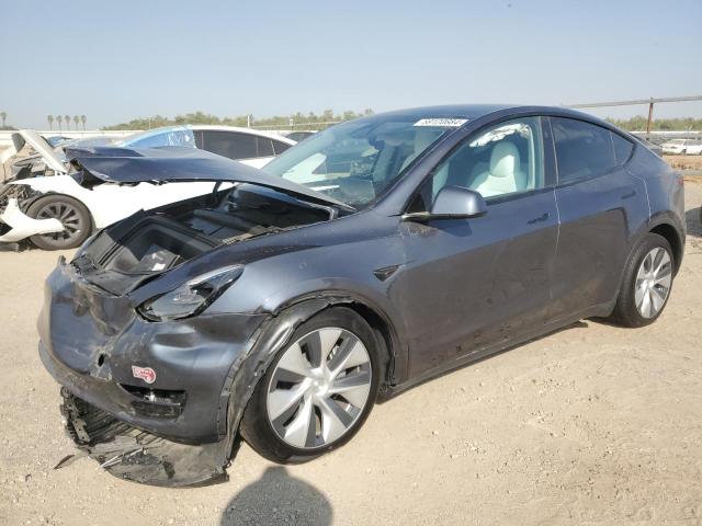 TESLA MODEL Y 2023 with VIN 7SAYGDEE0PF961934 - Photo from auction