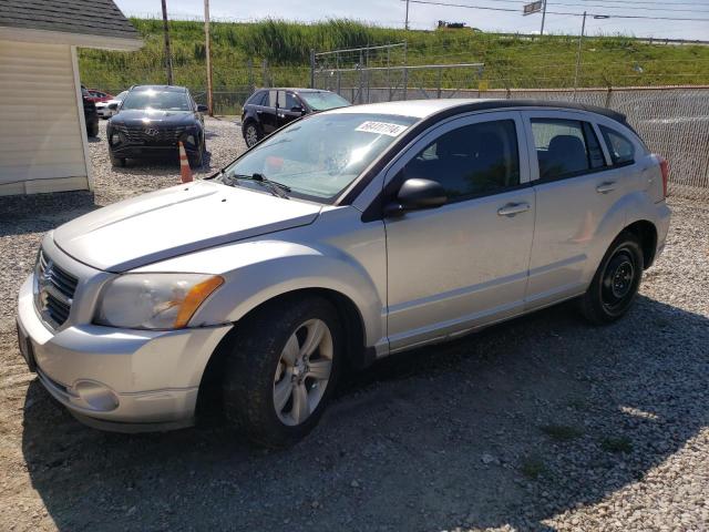 DODGE CALIBER MA 2010 with VIN 1B3CB3HA1AD671999 - Photo from auction