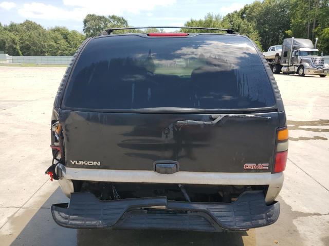 Photo 6 from auction – 2004 GMC YUKON with VIN 1GKEC13Z24J117077