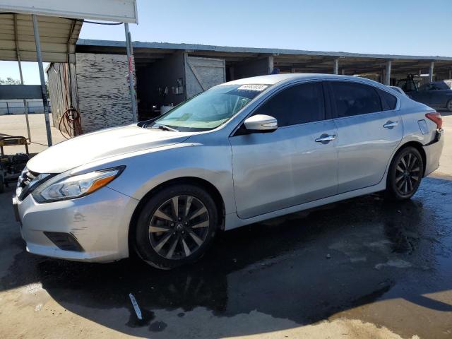 NISSAN ALTIMA 2.5 2018 with VIN 1N4AL3AP4JC159442 - Photo from auction
