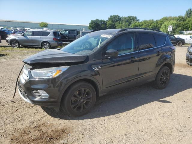 FORD ESCAPE SE 2018 with VIN 1FMCU9GD4JUB23031 - Photo from auction