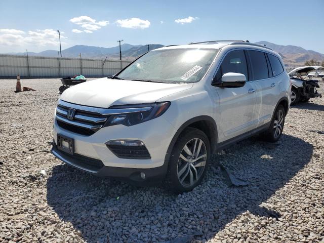 Photo 1 from auction – 2017 HONDA PILOT TOUR with VIN 5FNYF6H98HB042033