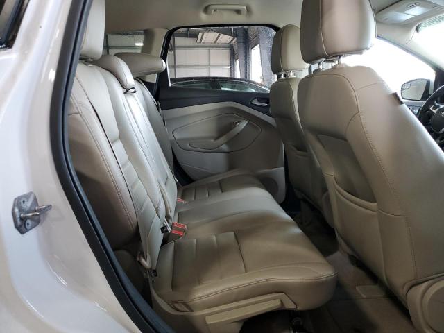 Photo 11 from auction – 2014 FORD ESCAPE TIT with VIN 1FMCU9J99EUD52766
