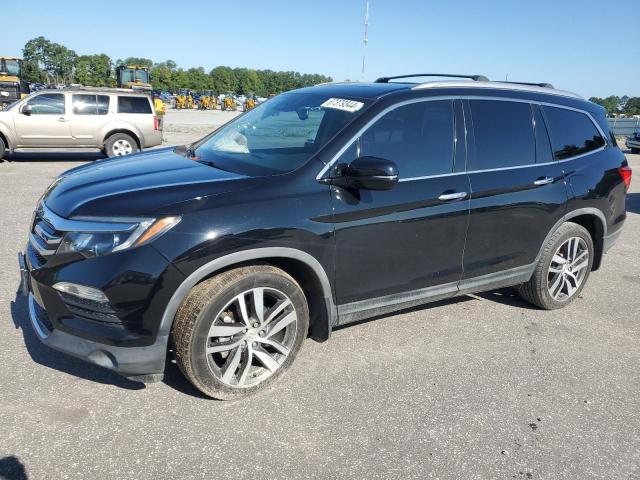 Photo 1 from auction – 2017 HONDA PILOT TOUR with VIN 5FNYF5H98HB008104