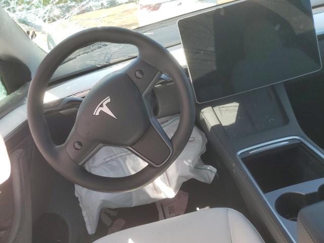 Photo 8 from auction – 2023 TESLA MODEL Y with VIN 7SAYGDED6PF930615