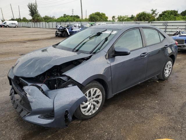 TOYOTA COROLLA L 2019 with VIN 5YFBURHE4KP921423 - Photo from auction