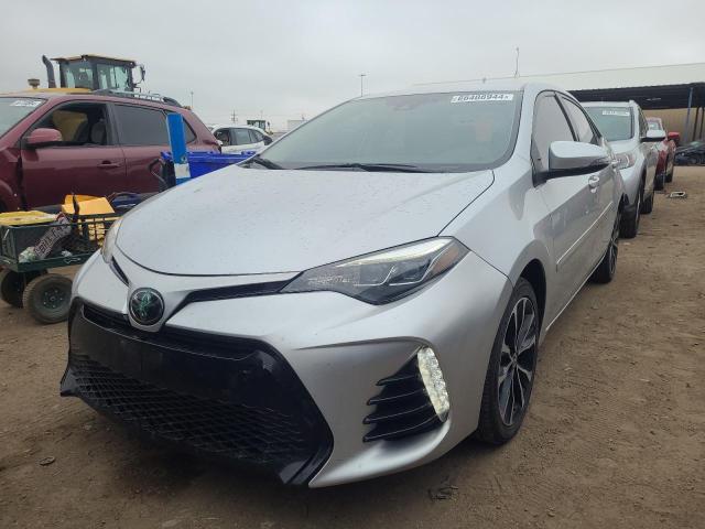 TOYOTA COROLLA L 2018 with VIN 2T1BURHE8JC048628 - Photo from auction