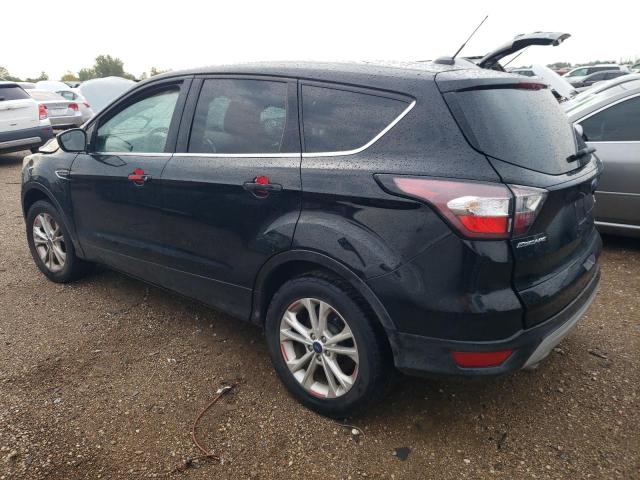 Photo 2 from auction – 2017 FORD ESCAPE SE with VIN 1FMCU9G90HUB04367