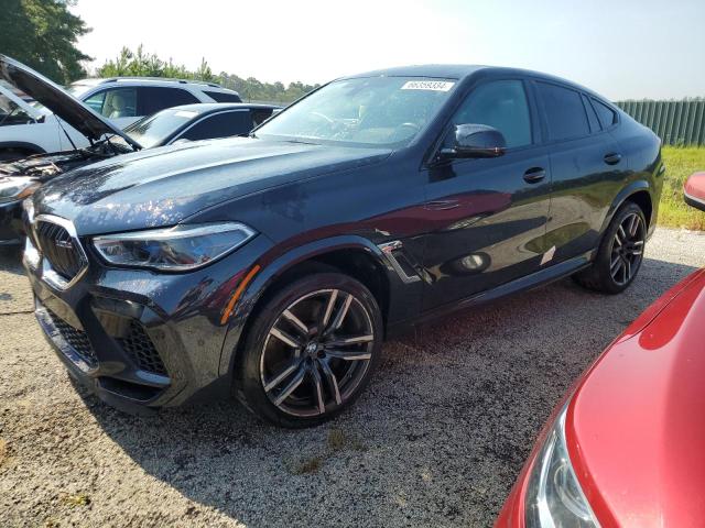 BMW X6 M 2021 with VIN 5YMCY0C06M9J01179 - Photo from auction