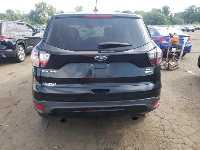 Photo 6 from auction – 2018 FORD ESCAPE SE with VIN 1FMCU9GDXJUA93520