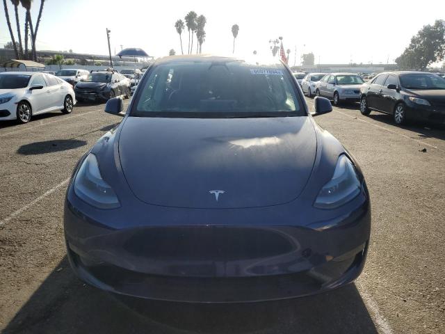 Photo 5 from auction – 2022 TESLA MODEL Y with VIN 7SAYGDEF8NF446623