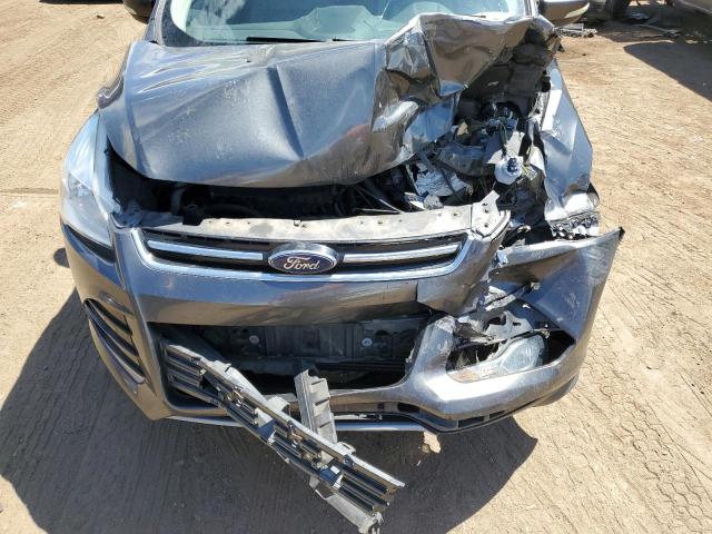 Photo 11 from auction – 2016 FORD ESCAPE TIT with VIN 1FMCU9J98GUC90361