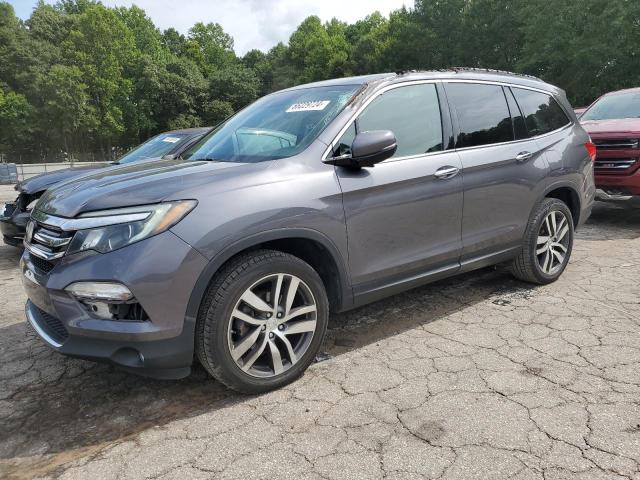 HONDA PILOT ELIT 2017 with VIN 5FNYF6H03HB025495 - Photo from auction