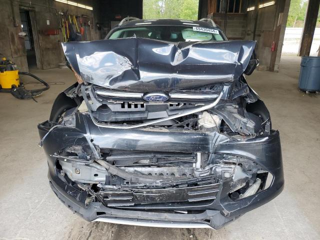 Foto 5 de la subasta – 2014 FORD ESCAPE TIT con VIN 1FMCU9JX4EUB37312