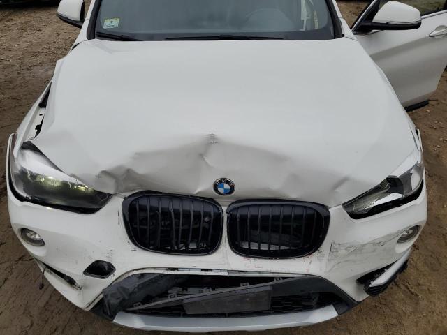 Photo 12 from auction – 2018 BMW X1 XDRIVE2 with VIN WBXHT3C35J5F92331