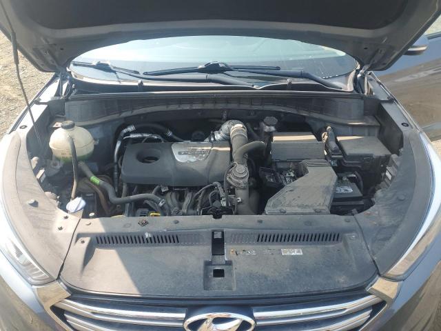 Photo 12 from auction – 2018 HYUNDAI TUCSON VAL with VIN KM8J3CA25JU642698