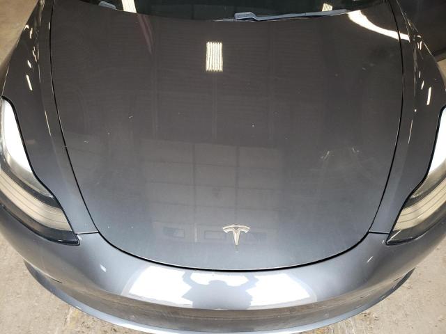 Photo 11 from auction – 2018 TESLA MODEL 3 with VIN 5YJ3E1EB0JF074438