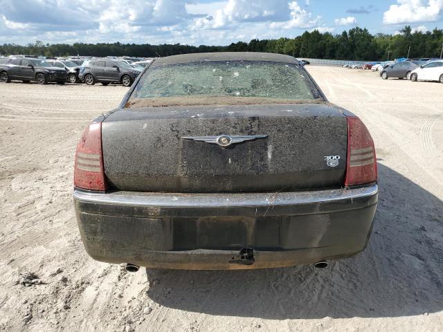 Photo 6 from auction – 2006 CHRYSLER 300C with VIN 2C3KA63H76H409258