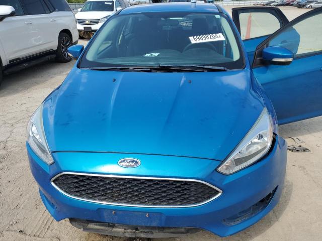 Photo 11 from auction – 2015 FORD FOCUS SE with VIN 1FADP3K27FL216860