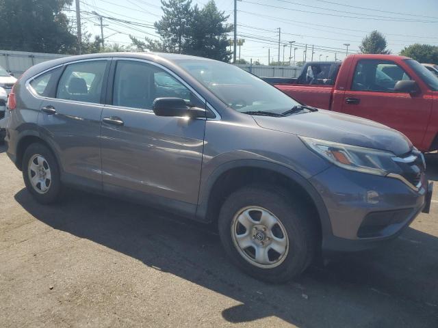 Photo 4 from auction – 2015 HONDA CRV LX with VIN 5J6RM4H38FL132653