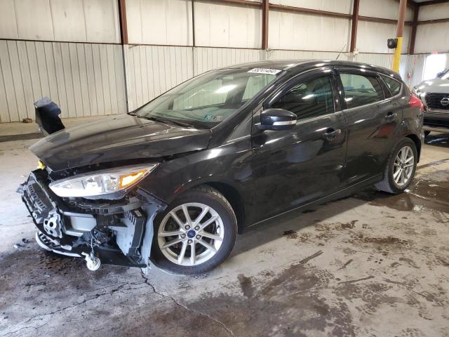 FORD FOCUS SE 2015 with VIN 1FADP3K28FL243677 - Photo from auction