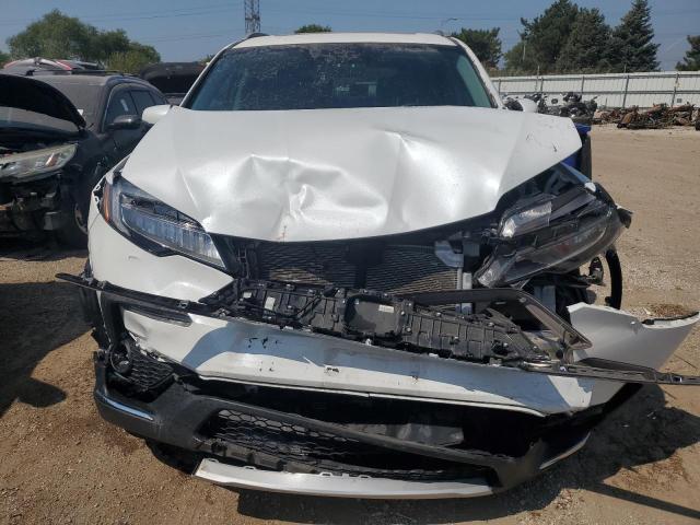 Photo 5 from auction – 2021 HONDA PILOT ELIT with VIN 5FNYF6H04MB049895