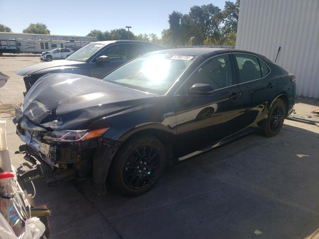 TOYOTA CAMRY LE 2020 with VIN 4T1C31AKXLU523545 - Photo from auction