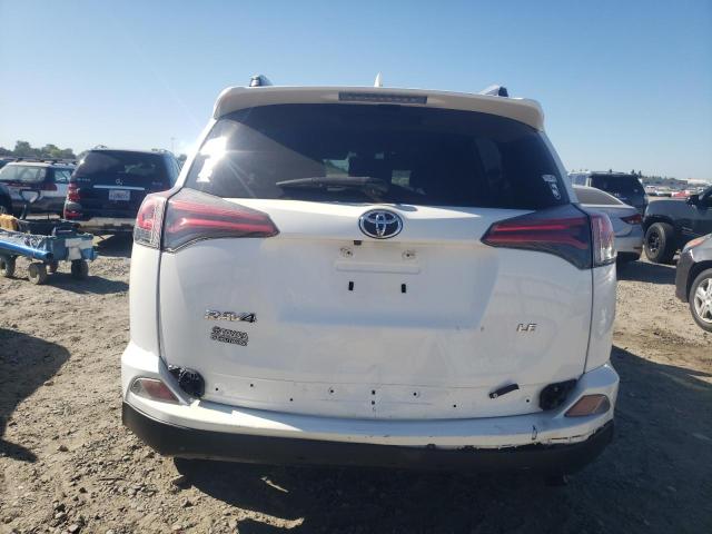 Photo 6 from auction – 2018 TOYOTA RAV4 LE with VIN JTMZFREV8JJ201302