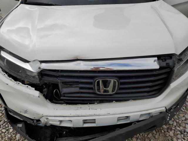 Photo 11 from auction – 2023 HONDA RIDGELINE with VIN 5FPYK3F55PB044466