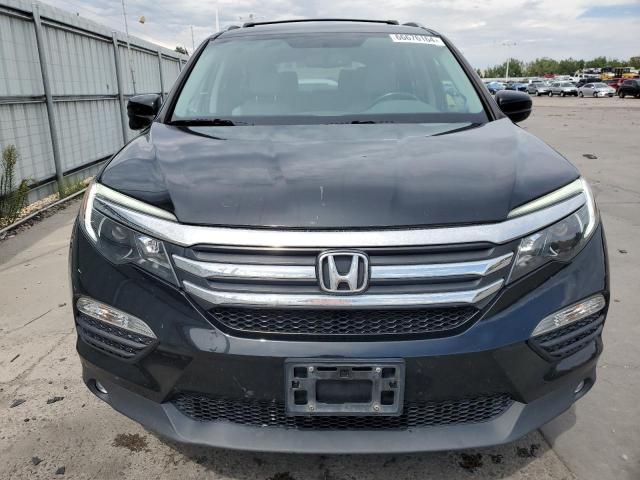 Photo 5 from auction – 2016 HONDA PILOT EXL with VIN 5FNYF6H54GB015262