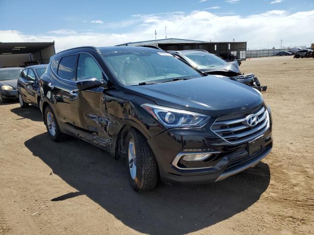 Photo 4 from auction – 2018 HYUNDAI SANTA FE S with VIN 5NMZU3LB1JH055553