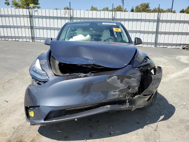 Photo 5 from auction – 2022 TESLA MODEL Y with VIN 7SAYGDEE8NF358985