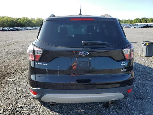 Photo 6 from auction – 2017 FORD ESCAPE SE with VIN 1FMCU9GD7HUC98495