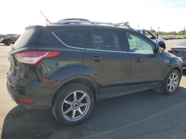 Foto 3 de la subasta – 2014 FORD ESCAPE TIT con VIN 1FMCU9JX2EUD12883