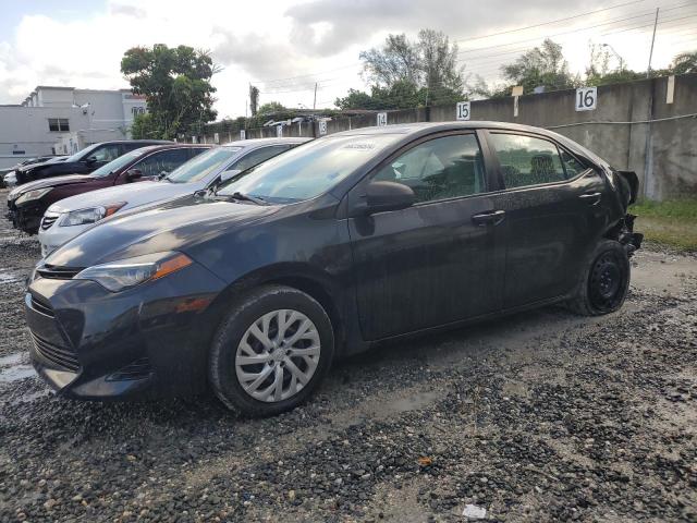 TOYOTA COROLLA L 2018 with VIN 5YFBURHE5JP843796 - Photo from auction