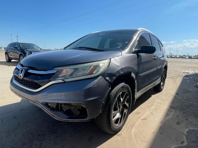 Photo 2 from auction – 2016 HONDA CR-V SE with VIN 2HKRM3H41GH521889
