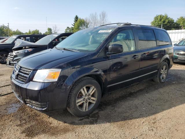 DODGE GRAND CARA 2010 with VIN 2D4RN4DE3AR173124 - Photo from auction