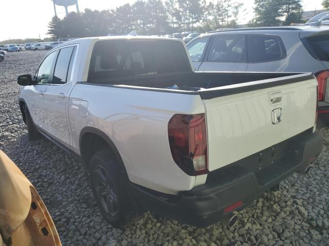 Photo 2 from auction – 2023 HONDA RIDGELINE with VIN 5FPYK3F52PB050984